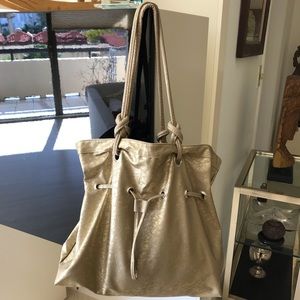 Oversized gold tone tote